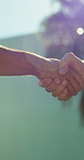 City, business people and handshake for deal, partnership or real estate agreement with b2b offer. Collaboration, shaking hands and thank you with investment opportunity, property purchase or success