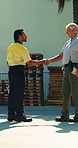 Handshake, logistics and meeting with men at depot together for delivery discussion or planning. Distribution, shipping and supply chain with people shaking hands outdoor for storage management