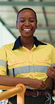 Happy, black woman and face with security by warehouse for freight safety or shipping control. Portrait, female person or inspector with smile, clipboard or storage management for quality assurance