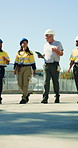Business people, walking and team with supervisor for logistics, shipping or distribution. Executive, security or inspector talking to group for quality assurance, storage security or freight safety