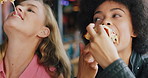 Friends, women and eating pizza at restaurant, social hangout and bonding together on holiday. Fast food, people and sharing lunch at diner, hungry and relax with happiness on weekend vacation
