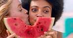 Happy women, lesbian couple and watermelon with kiss for selfie, picture or photography together. Female people, LGBTQ or capture moment with summer fruit or app for holiday, outdoor vacation or love