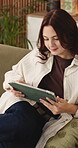 Relax, sofa or woman with tablet for streaming, movie subscription website or ebook app for entertainment. Chill, smile or person with tech to check film selection, reading or watch video in home