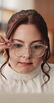 Business, woman and glasses with laptop in office for research, proofreading and editing draft. Person, eyewear and reading with pc for editor feedback, fact check and review source for publication