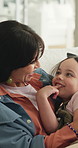 Mother, child and hug in home for care, relax and bonding together with parent for happiness. Mom, girl and embrace in living room with kid for connection, talking and support  for love with daughter