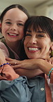 Face, mama and child in home for love, kiss cheek and embrace with parent for happiness. Mom, girl and hug in lounge with kid for connection, trust and support for care with portrait on mothers day