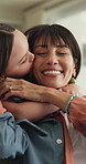 Mama, child and kiss cheek in home for love, relax together or hug with parent for happiness. Mother, girl and embrace in living room with kid for connection, trust and support for care with daughter