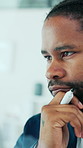 Thinking, business and black man by glass wall for writing strategy, problem solving and budget solution. Corporate, office and person with ideas for investment choice, financial growth and planning