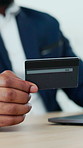 Business person, hands or online shopping with credit card in office for virtual payment or banking. Employee, shopper or debit on laptop for ecommerce, wireless transaction or purchase in workplace