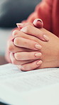 Praying, religion and hands of woman with bible in home for praise, faith or spiritual wellness. Scripture, holy book and female person with prayer in house for hope, forgiveness or gratitude.