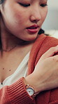 Hands, woman and rub arm pain in home for muscle sprain, inflammation and injury discomfort. Tendinitis, asian person and pinched nerve in apartment with joint compression, osteoporosis and pressure