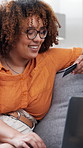 Happy woman, laptop and credit card in home for e commerce, transaction or discount sale in lounge. Person, computer and smile with fintech, typing or easy payment for online shopping in apartment