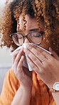 Sick, woman and sneezing with tissue in home from sinus, nasal congestion and flu symptoms. Person, napkin and wipe nose with viral infection, contagious illness and allergies from influenza disease