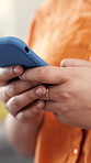 Hands, phone and texting for contact in home on web, chat and communication with online dating. Person, smartphone and click with mobile app, post or notification with social network at apartment