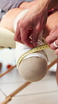 Hands, physio and measure leg of amputee for fitting, prosthetic limb and rehabilitation. Physiotherapist, tape and patient with disability for socket design, medical assessment and correct length