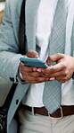 Texting, hands and phone with business man in city for communication, real estate listing and connection. Typing, client feedback and property viewing schedule with person and mobile outdoor