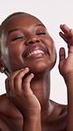 Face, skincare and woman with smile in studio for beauty, wellness glow and smooth texture benefits. Portrait, dermatology and black person with self care for soft skin, happy and white background