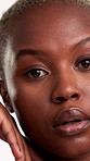 Serious, face and black woman in studio with skincare, vision and contemplation for antiaging benefits. Confident, person and dermatology for glowing skin, self care and thinking on white background.