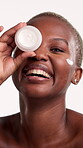 Face, skincare or black woman with jar in studio, collagen moisturizer or facial treatment for beauty. Portrait, dermatology or happy person with cream for hydration, skin glow or white background