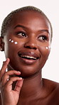 Face, cream or black woman with skincare in studio, collagen moisturizer or facial beauty treatment. Portrait, dermatology or happy person with lotion for hydration, glowing skin or white background