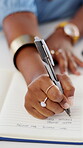 Businesswoman, hand and writing in office with notebook, goal setting or agenda for project management. Person, journal notes or daily administration in workplace with task priority, plan or reminder