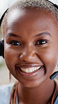Face, headset and black woman at call center for telemarketing, lead generation and about us. Portrait, hotline and sales consultant with smile for telesales, pride or outbound service with employee