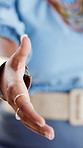 Business, closeup and woman in office, handshake for agreement and partnership. Shaking hands, person and professional in workplace, greeting and hello with introduction, welcome and onboarding