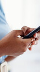 Typing, hands or person with phone in office, monitor campaign engagement or marketing feedback. Check comments, scroll or social media manager with mobile for planning, trend research or ad reviews