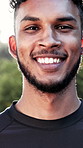 Face, runner and man outdoor with fitness, training goals and positive attitude for exercise start. Happy, active person and athlete with confidence, wellness and getting ready for sports workout.