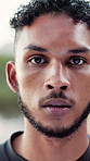 Fitness, serious and face of man outdoor on break for exercise, training or wellness in nature. Sports, health and portrait of male athlete with breathing for workout, active or running challenge.