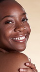 Happy, black woman and skincare for face, beauty and dermatology for healthy skin benefits and glow. Studio background, portrait and person with smile for wellness, cosmetics and laughing in Kenya