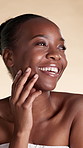 Skincare, happy and black woman with laugh in studio for natural texture, beauty and spa results. Salon, smile and person with satisfaction for dermatology, cosmetics or makeover on yellow background