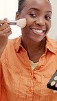 Home, black woman and content creator with makeup palette, brand promotion and recommendation video. Smile, live streaming or beauty influencer with brush to apply cosmetics, tutorial or sponsored ad