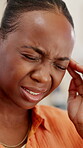 Woman, stress and headache in house with phone, mistake or text message response to wrong contact. Frustrated, black person and migraine in living room with tech, social media problem or online error