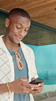 Black man, phone and vacation with typing for travel, weekend and break. Hotel, summer holiday and person with tech for influencer, social media and connection with app and luxury resort review