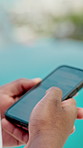 Hands, phone and vacation with pool for travel, weekend and scroll break. Hotel, summer holiday and person with tech for influencer, social media and connection with app and luxury resort review