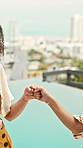 Friends, phone and fist bump with pool for vacation, travel and reunion with break. Hotel, summer holiday and women with tech for influencer, social media and greeting with app and resort review
