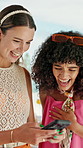 Women, conversation and phone at party with summer holiday, surprise or laugh for social media post. Happy, friends and discussion at resort with tech, notification or shock for funny vacation update