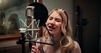 Microphone, singing and woman in studio for recording music with creative talent for album. Singer, artist and female musician with audio tech for production on song with media in sound booth