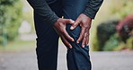 Person, hands and knee pain with injury in nature for discomfort, strain or overworked. Runner, sore bone or joint inflammation with fibromyalgia or leg ache for muscle tension or outdoor accident