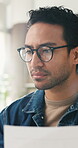 Reading, entrepreneur and man with document in small business, inventory checklist and delivery schedule. Review, procurement quote or person with courier info for dropshipping, flare or supply chain