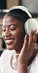 Shipping, office and black woman dance with headphones, streaming song or subscription service. Music, smile or entrepreneur in ecommerce startup for sound, break or listen to radio in small business