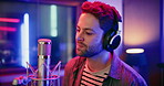 Microphone, man and singer in music booth with headphones for recording song with talent. Musician, media and male artist singing with audio tech for production on album in sound studio on radio.