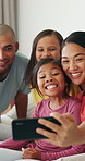 Happy family, selfie and parents with kids in bedroom for love, care or funny memory on social media. Mother, father and profile picture in bed with children at home for photography, laugh or bonding