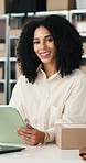 Boxes, face and tablet with woman in logistics office for management of delivery schedule. App, smile and supply chain with happy person at desk in workplace for distribution or shipping tracking