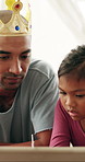 Relax, father and girl with tablet in home, streaming princess movie and watch cartoon for bonding. Film subscription, toys and man with child for connection, internet video or tech for entertainment
