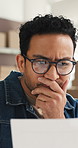 Document, confused or man in logistics office with order mistake or invoice error or thinking. Paperwork, unsure or entrepreneur in shipping startup with wrong info, reading or ecommerce problem