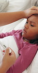 Fever, girl and thermometer of mother in bedroom of home for checkup, health monitoring or illness. Forehead, sick and temperature with daughter in bed for healing, parent care or wellness concern