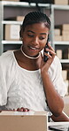 Phone call, box and black woman on laptop in logistics for shipping enquiry, order update or export. Small business, person and mobile chat in warehouse to track parcel, online delivery and schedule