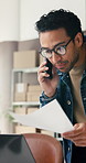 Laptop, paperwork and man with phone call in logistics for shipping, pricing enquiry or update. Small business, owner or contact client in warehouse for delivery invoice, online order or confirmation